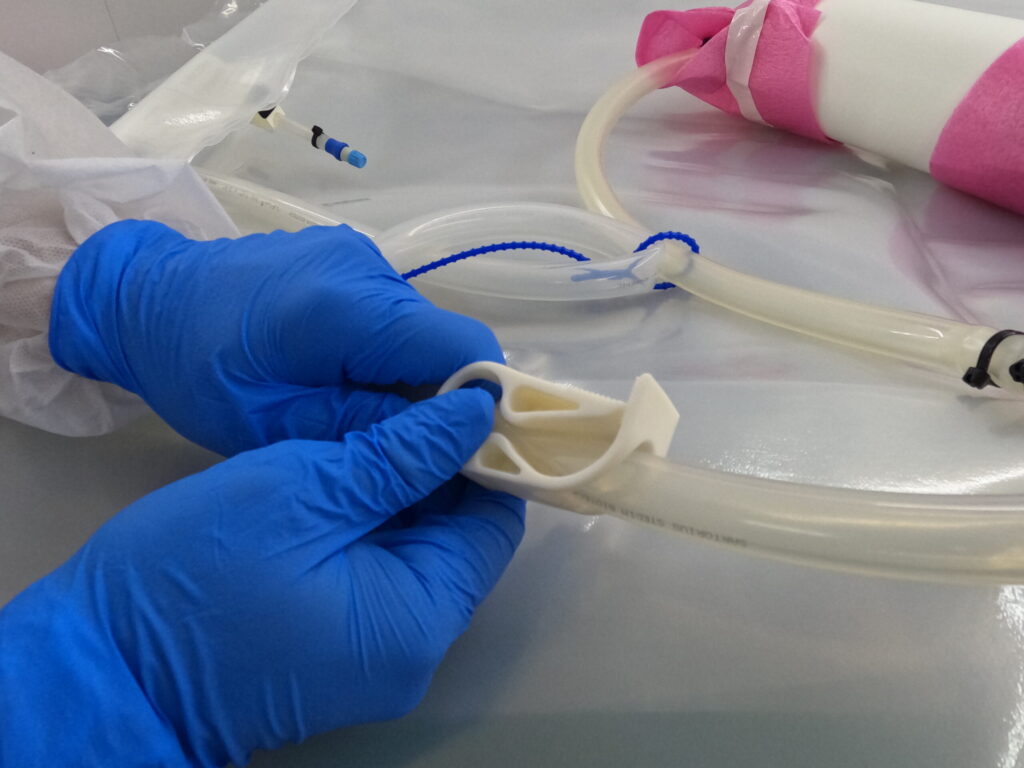 Bioprocessing tubing being adjusted